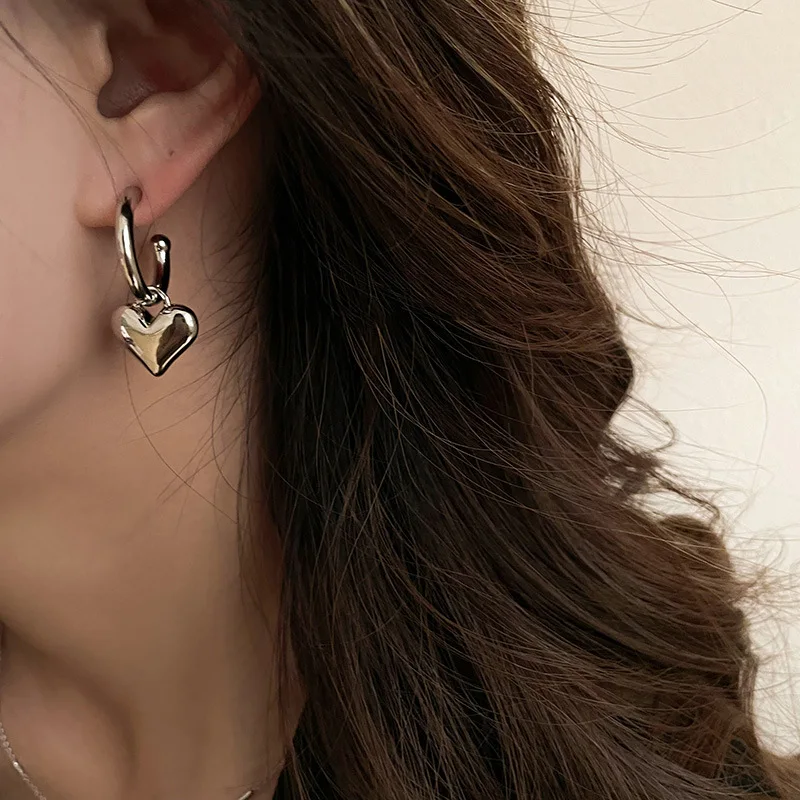HEART SILVER STUDS — detail view